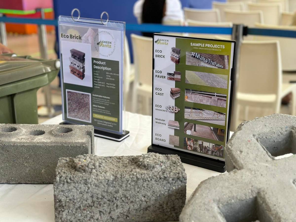 PBSP, Mondelez Philippines and Green Antz Builders build bricks made from waste plastic sachets for use in building and construction.
